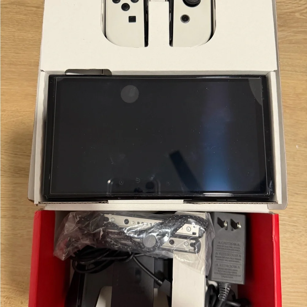 Nintendo Switch OLED (White) bundle. comes with all original parts and cords.